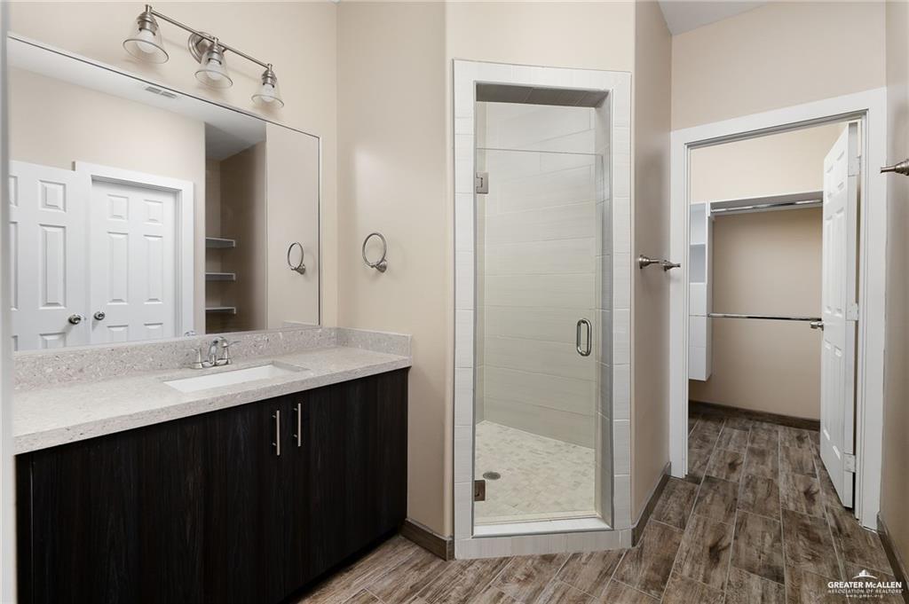 1809 Ramirez Street, Unit 2 Mission, TX 78573 - Photo 8 of 11 a bathroom with a sink and a mirror