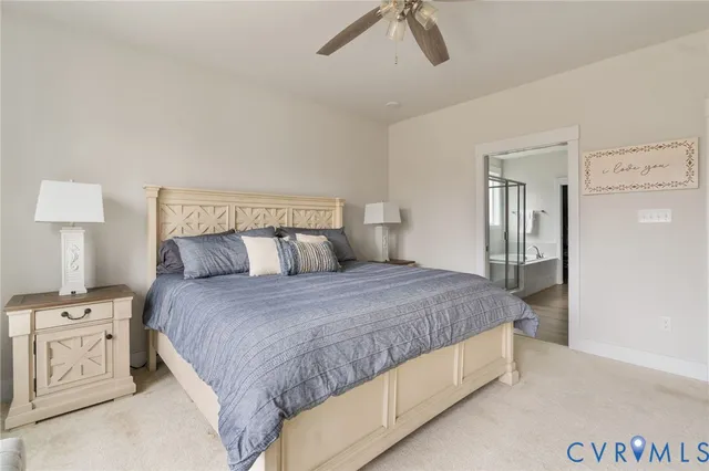 a bedroom with a bed and a night stand