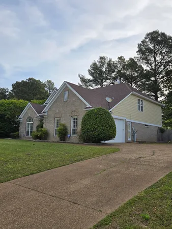 front view of a house with a yard
