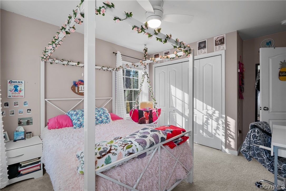 1700 Hybla Road North Chesterfield, VA 23236 - Photo 25 of 37 a bedroom with furniture and a chandelier