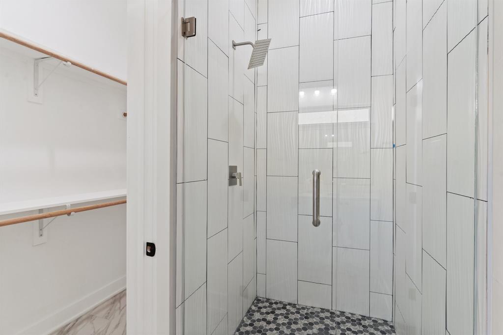 5810 Hudson Street, Unit 105 Dallas, TX 75206 - Photo 28 of 33 a bathroom with a shower