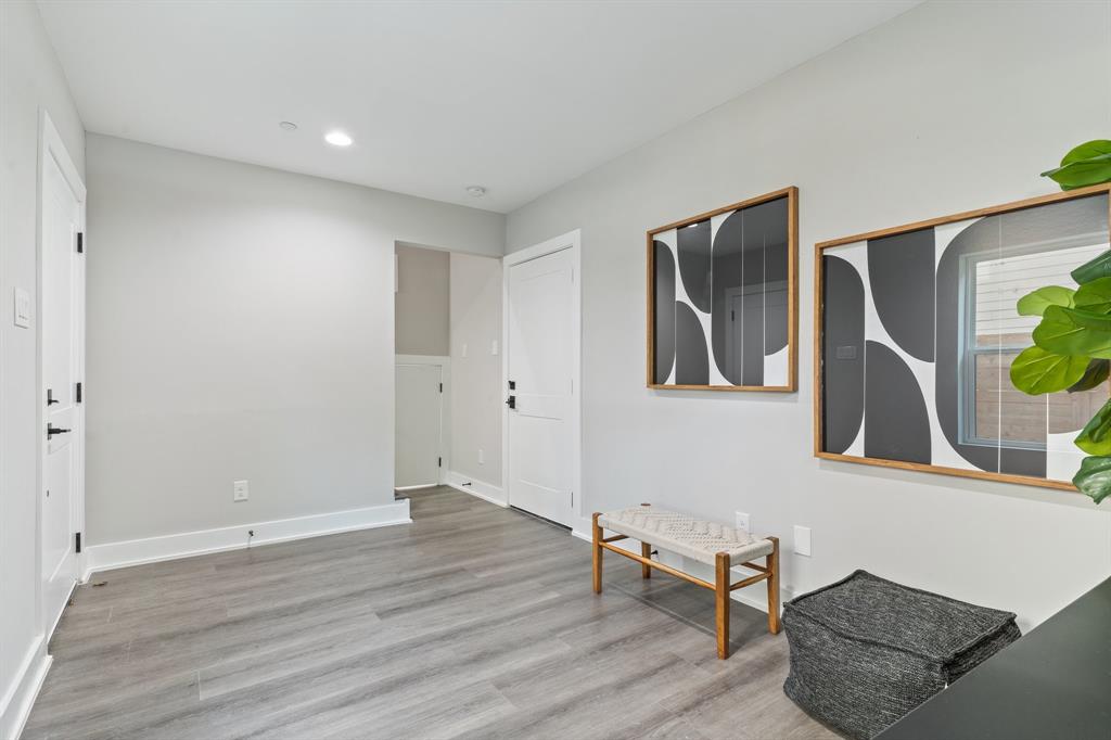 5810 Hudson Street, Unit 105 Dallas, TX 75206 - Photo 7 of 33 a view of livingroom with furniture and wooden floor