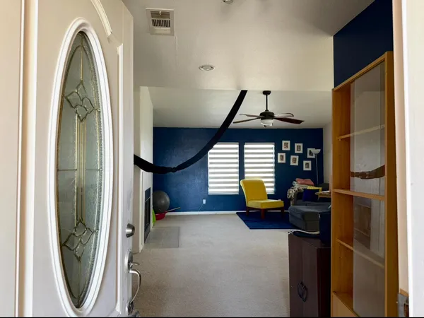 a kitchen with stainless steel appliances granite countertop a refrigerator sink and stove