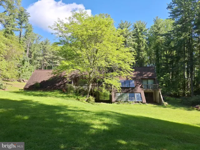 a view of a backyard with a garden