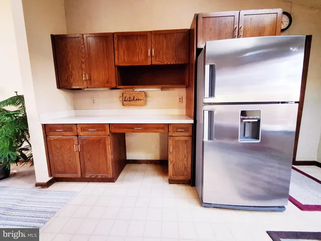 a view of entryway livingroom and hall
