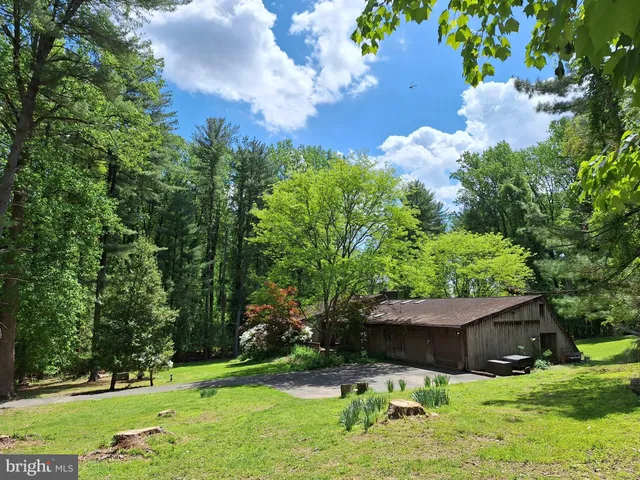 a room with pool table and windows