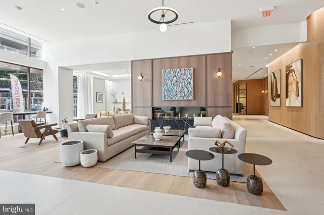 a living room with furniture dining table and a couch