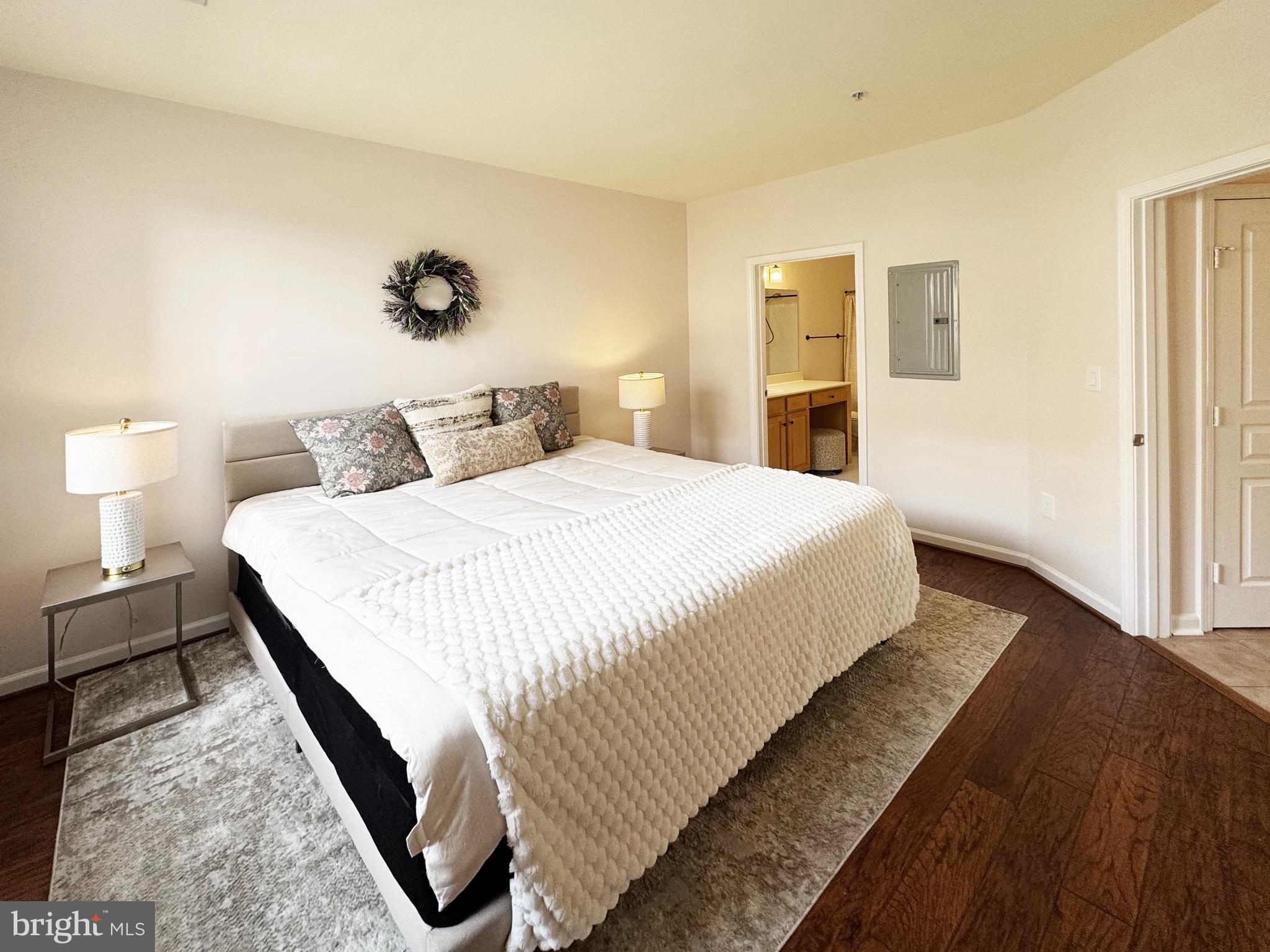 12001 Market Street, Unit 124 Reston, VA 20190 - Photo 16 of 42 With Walk-In Closet