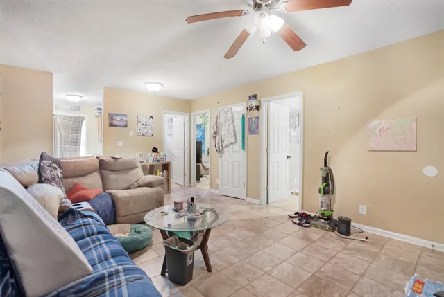 a living room with furniture and a window