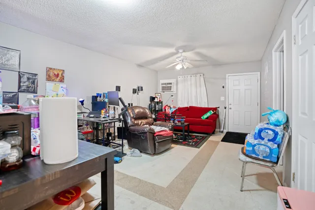 a bathroom with a sink vanity and mirror