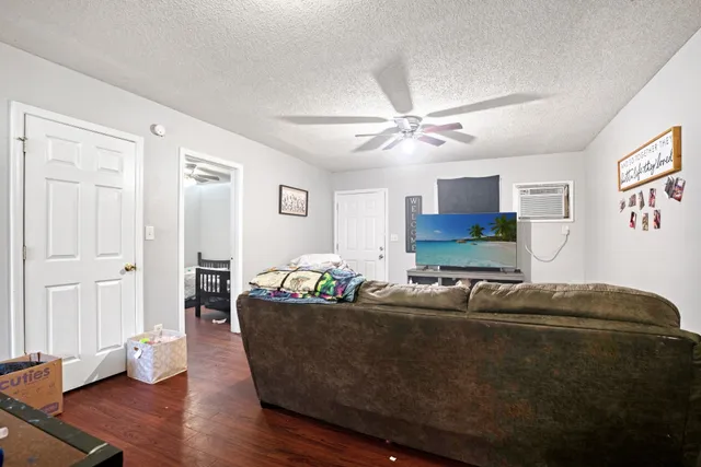 a kitchen with a stove and a refrigerator