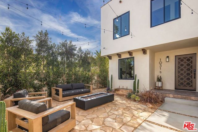 a building outdoor space with patio furniture