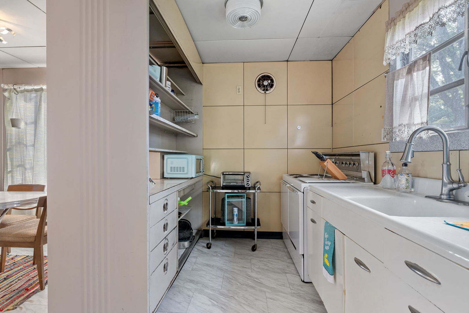 1401 Linden Road Homewood, IL 60430 - Photo 8 of 14 a kitchen with a sink and a stove top oven