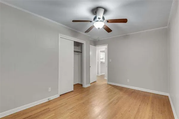 a bed room with a bed and a window