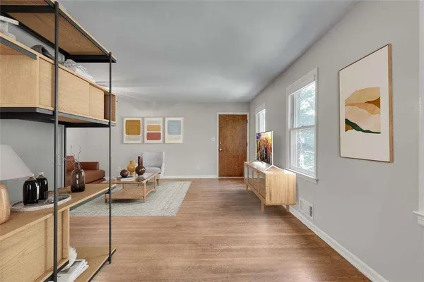 a view of an empty room with a window