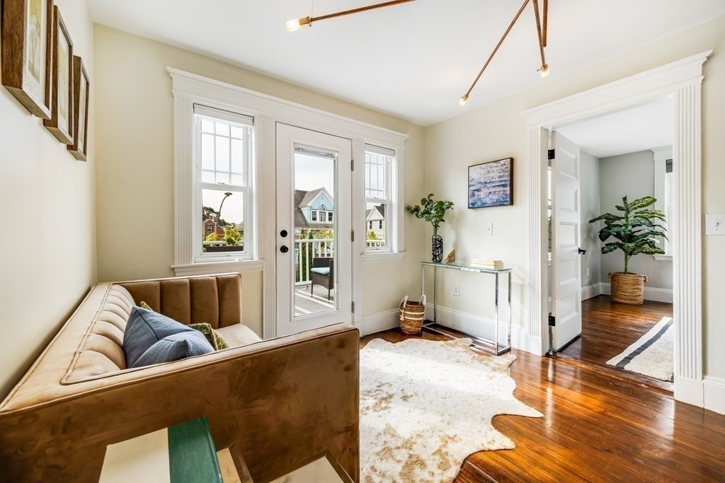 39 Rosedale Street Boston, MA 02124 - Photo 15 of 42 a living room with furniture and a couch