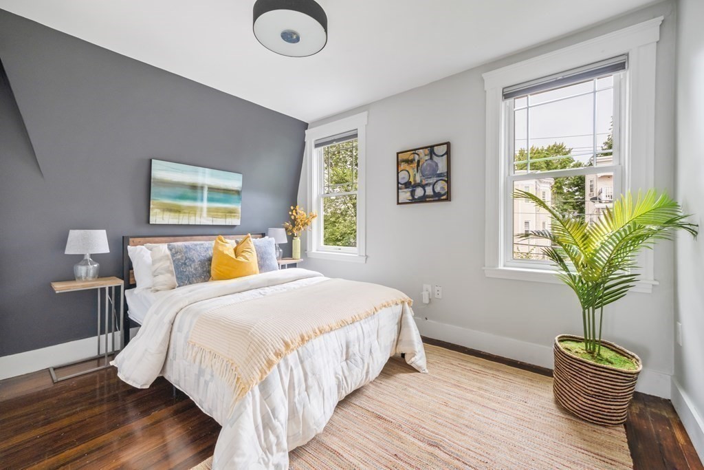 39 Rosedale Street Boston, MA 02124 - Photo 17 of 42 a bedroom with a bed and a window