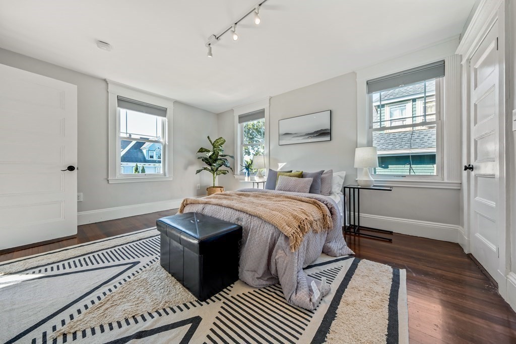 39 Rosedale Street Boston, MA 02124 - Photo 18 of 42 a bedroom with a bed and a window