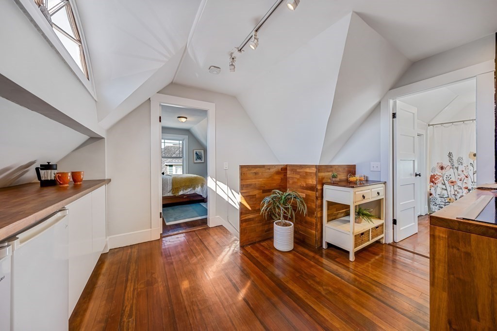 39 Rosedale Street Boston, MA 02124 - Photo 22 of 42 a bedroom with furniture and window