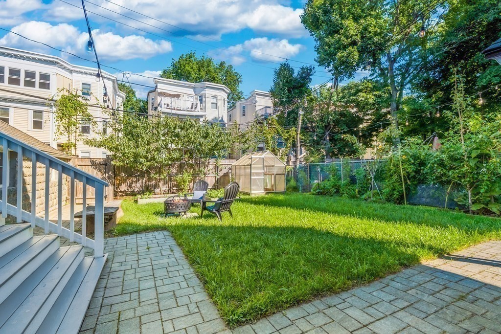 39 Rosedale Street Boston, MA 02124 - Photo 27 of 42 a front view of a house with a yard