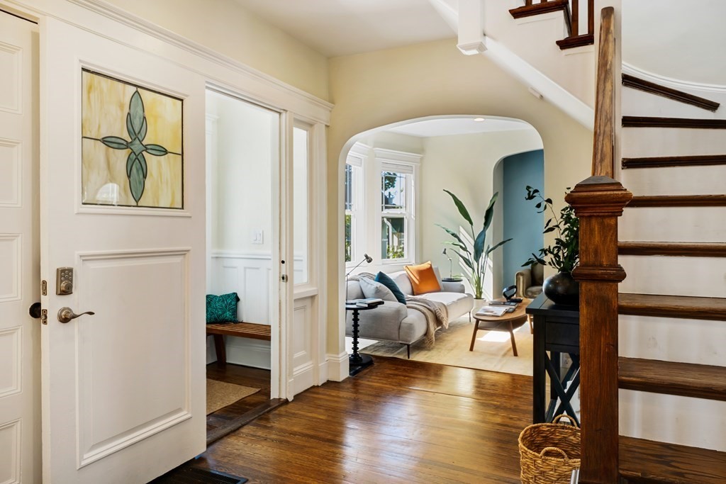 39 Rosedale Street Boston, MA 02124 - Photo 3 of 42 a living room with furniture and wooden floor