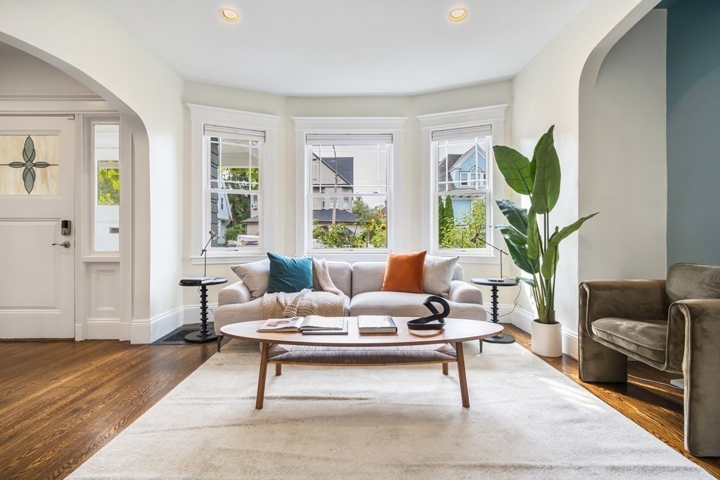 39 Rosedale Street Boston, MA 02124 - Photo 4 of 42 a living room with furniture and a potted plant