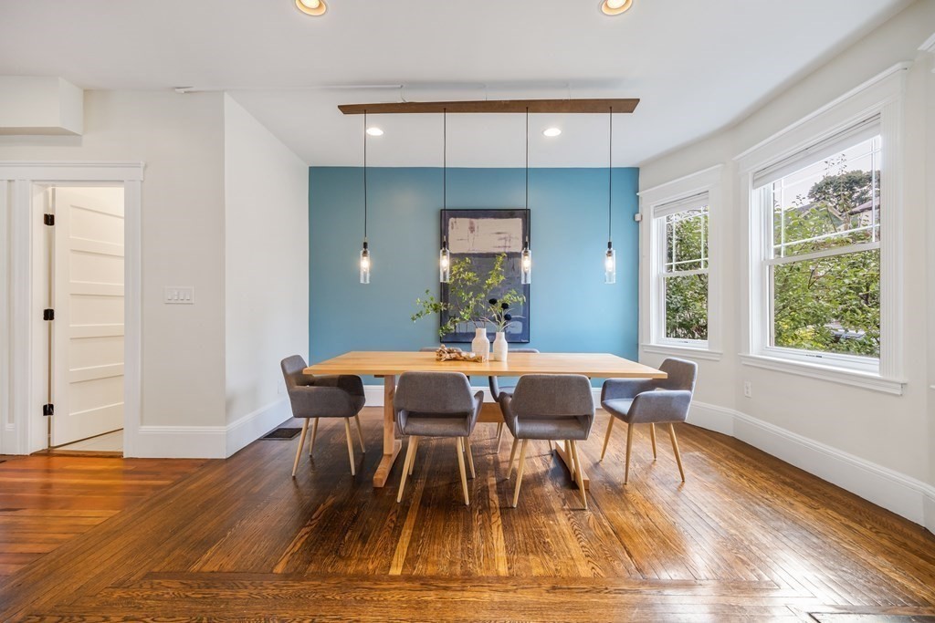 39 Rosedale Street Boston, MA 02124 - Photo 6 of 42 a view of a dining room with furniture window and wooden floor