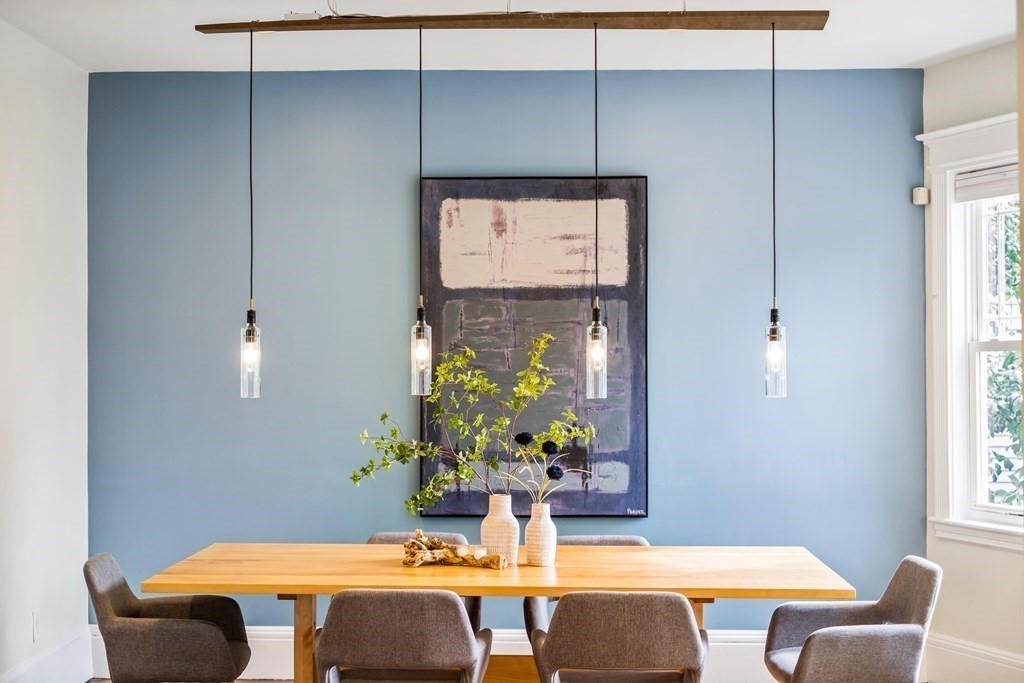 39 Rosedale Street Boston, MA 02124 - Photo 7 of 42 a view of a dining room with a table and chairs
