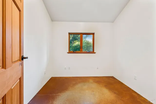 a view of a room with a window