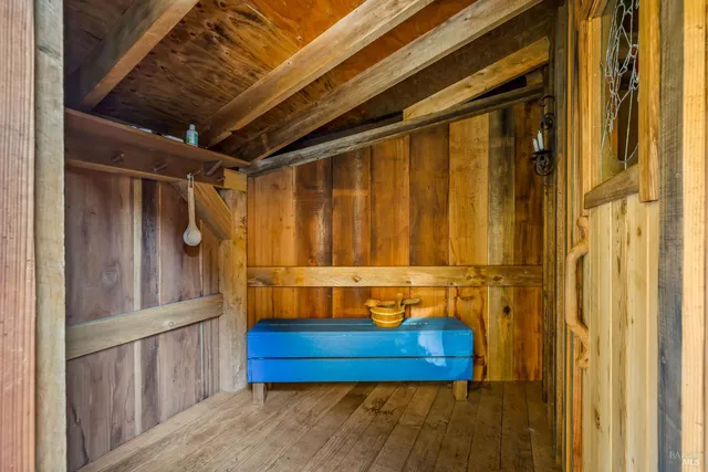 a view of a balcony with table and chairs