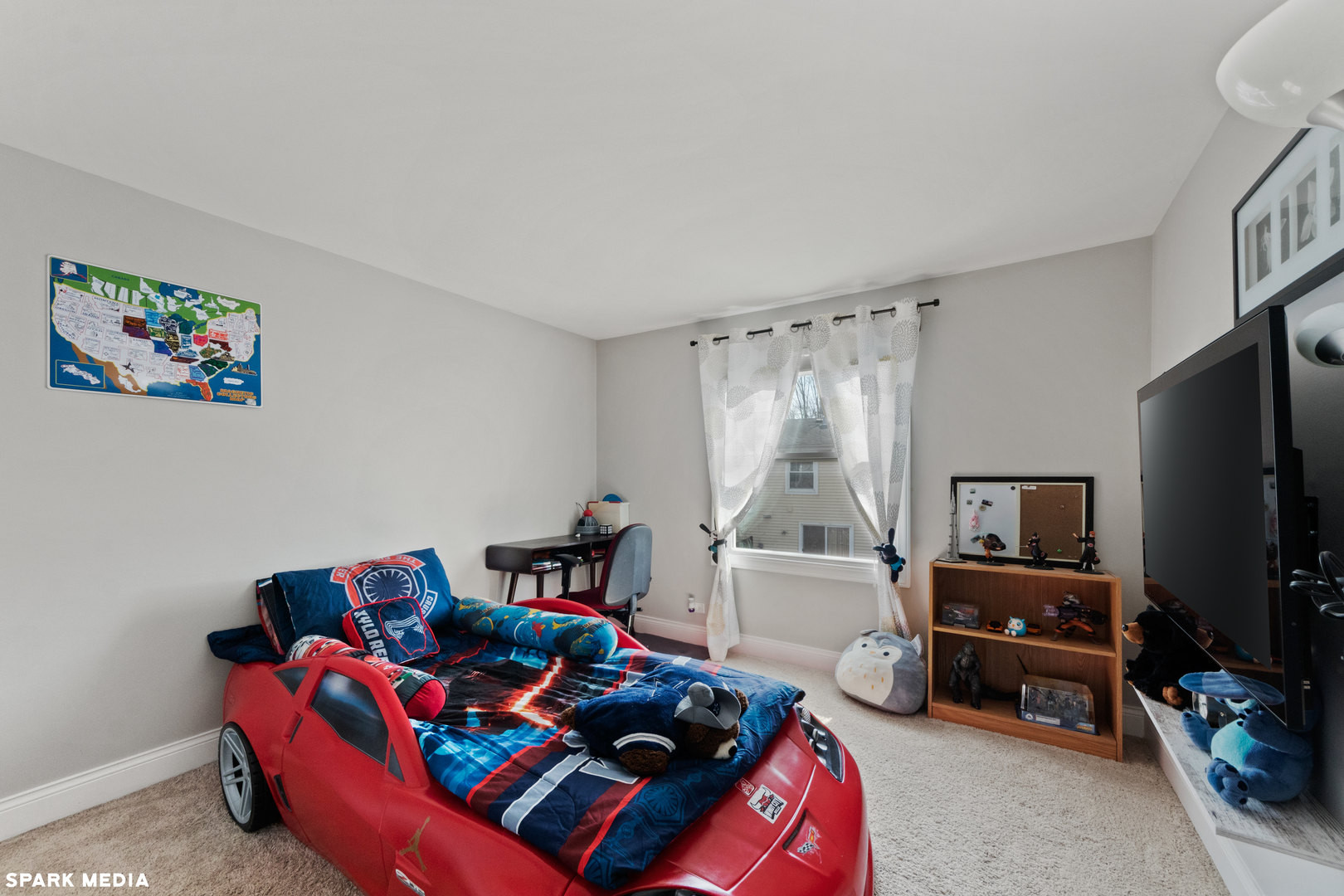 7612 Manchester Manor Hanover Park, IL 60133 - Photo 19 of 30 a bedroom with furniture and a flat screen tv