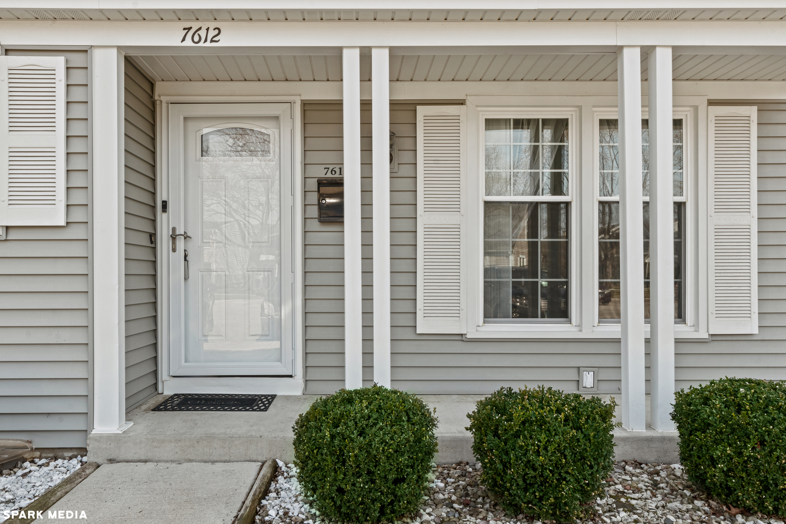 7612 Manchester Manor Hanover Park, IL 60133 - Photo 2 of 30 a view of front door of house
