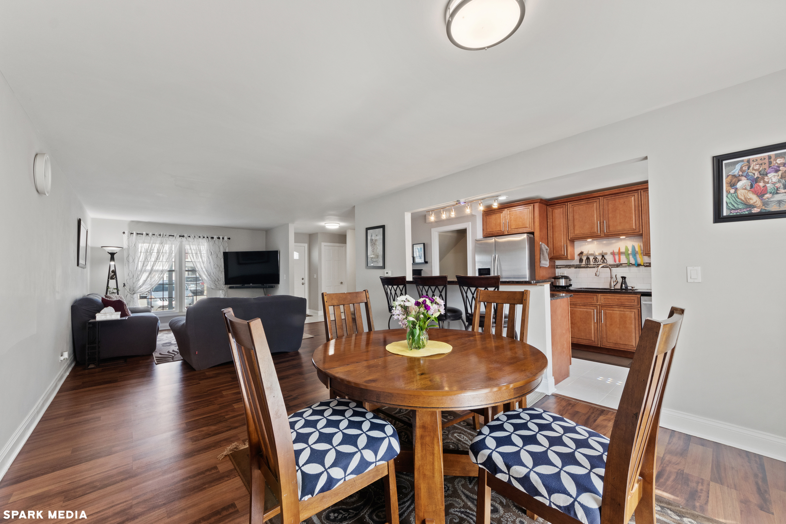 7612 Manchester Manor Hanover Park, IL 60133 - Photo 8 of 30 a dining room with furniture and wooden floor