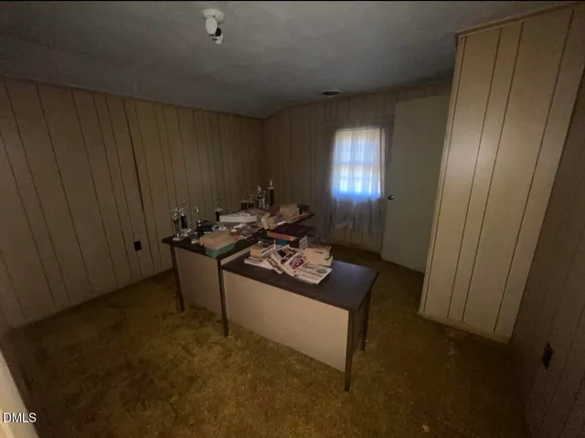 a room with furniture and a window