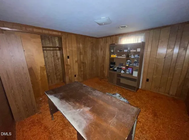 a view of a hallway with closet