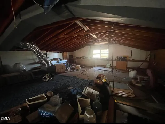 a view of room with gym equipment