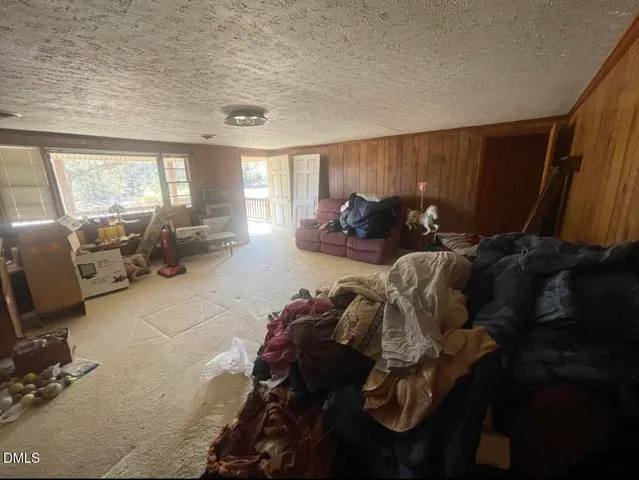 a bed room with a bed and a couch