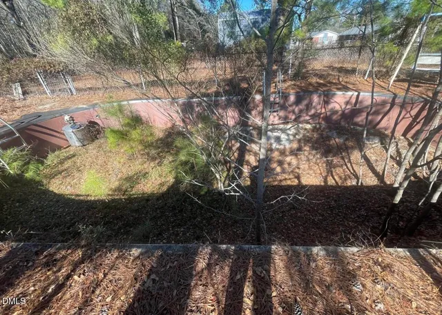 a view of outdoor space and covered with trees