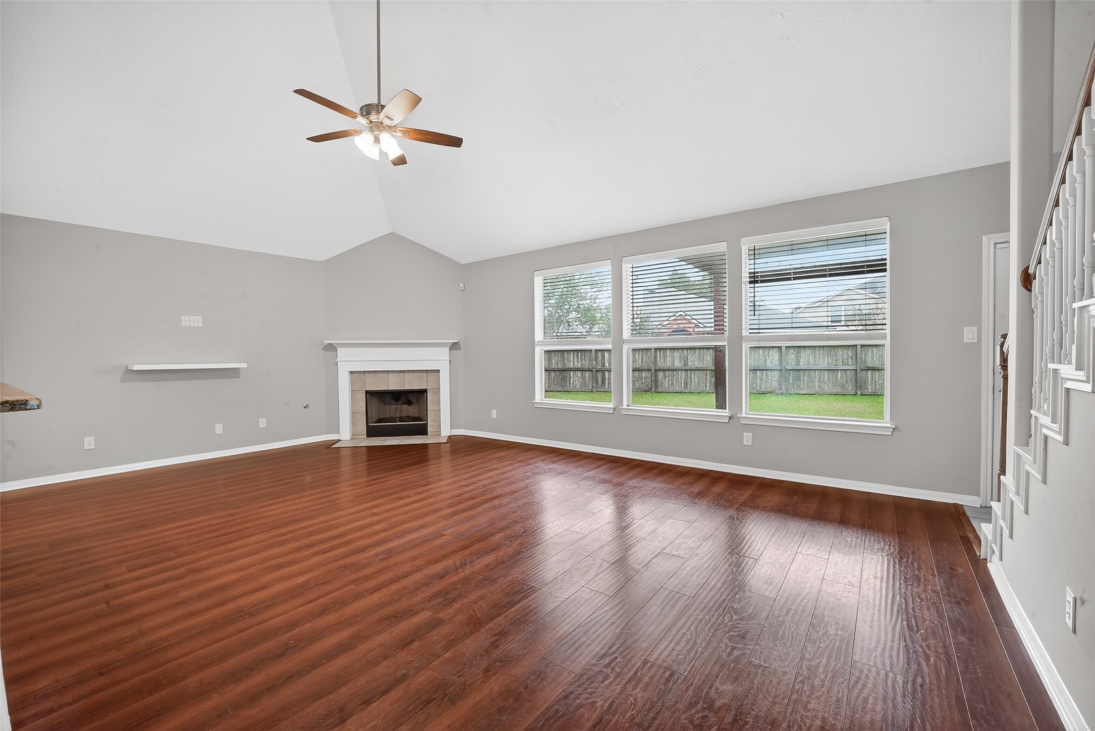 14308 Rocky Briar Lane Rosharon, TX 77583 - Photo 20 of 46 an empty room with wooden floor fan and windows