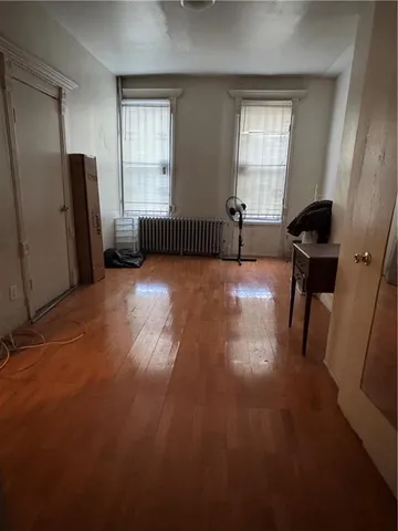 a view of livingroom with hardwood floor and window