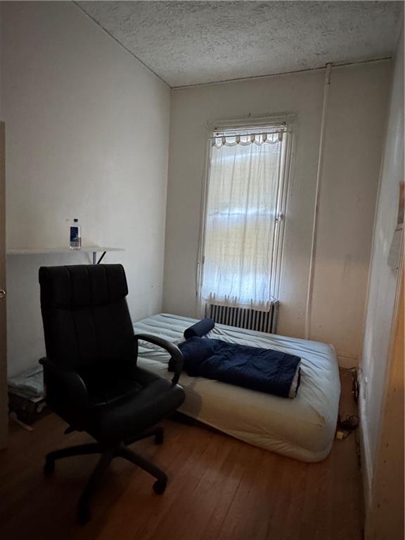 6 Pilling Street Brooklyn, NY 11207 - Photo 12 of 18 a living room with furniture