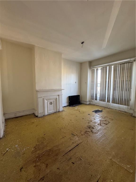 6 Pilling Street Brooklyn, NY 11207 - Photo 15 of 18 a view of an empty room with a window