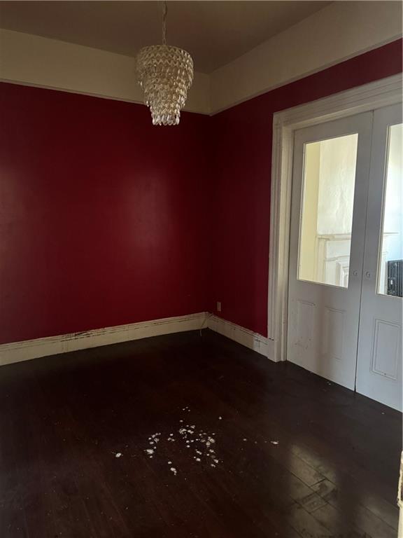 6 Pilling Street Brooklyn, NY 11207 - Photo 17 of 18 a view of a livingroom with a chandelier
