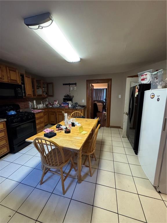 6 Pilling Street Brooklyn, NY 11207 - Photo 5 of 18 a kitchen with stainless steel appliances a sink a counter top space and cabinets