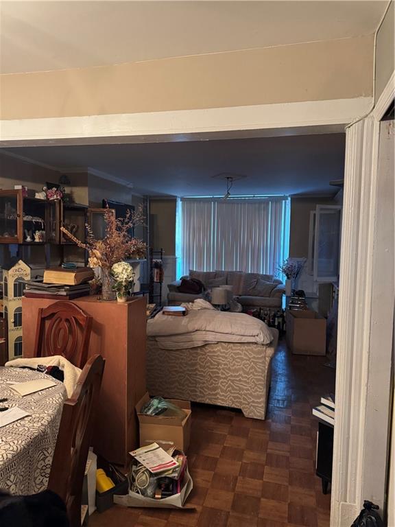 6 Pilling Street Brooklyn, NY 11207 - Photo 7 of 18 a bed room with a bed and a chair