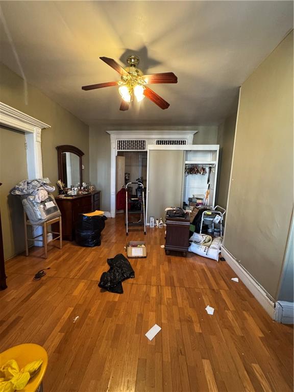 6 Pilling Street Brooklyn, NY 11207 - Photo 10 of 18 a living room with furniture and a wooden floor