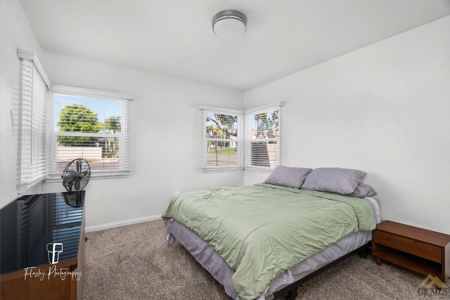 Undisclosed Address Bakersfield, CA 93305 - Photo 18 of 20 a bedroom with a bed and a couch