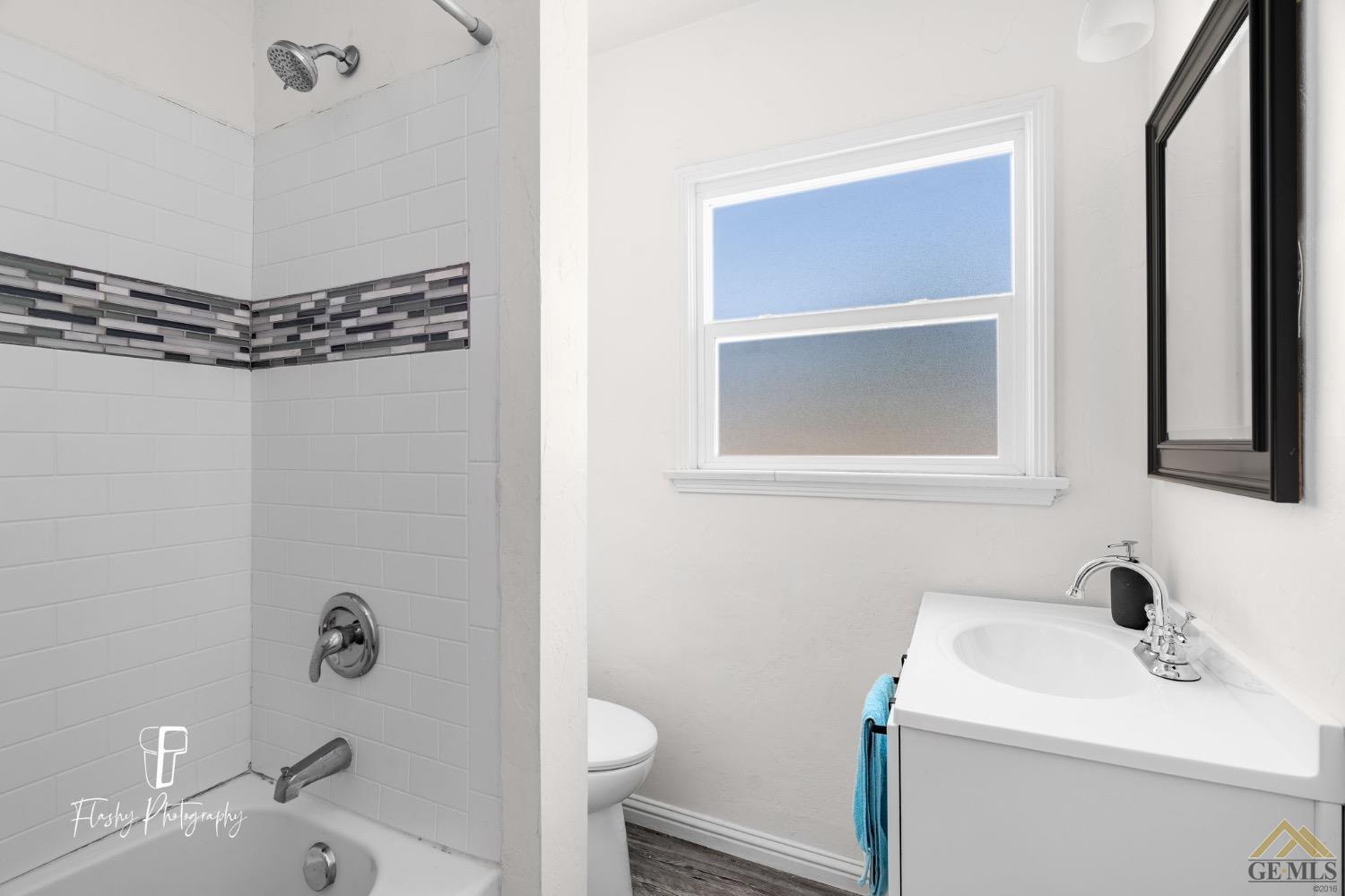 Undisclosed Address Bakersfield, CA 93305 - Photo 19 of 20 a bathroom with a sink a toilet and shower