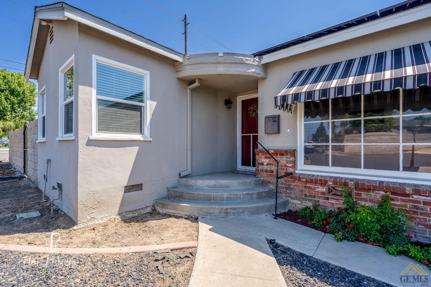 Undisclosed Address Bakersfield, CA 93305 - Photo 3 of 20 a view of a house with entrance