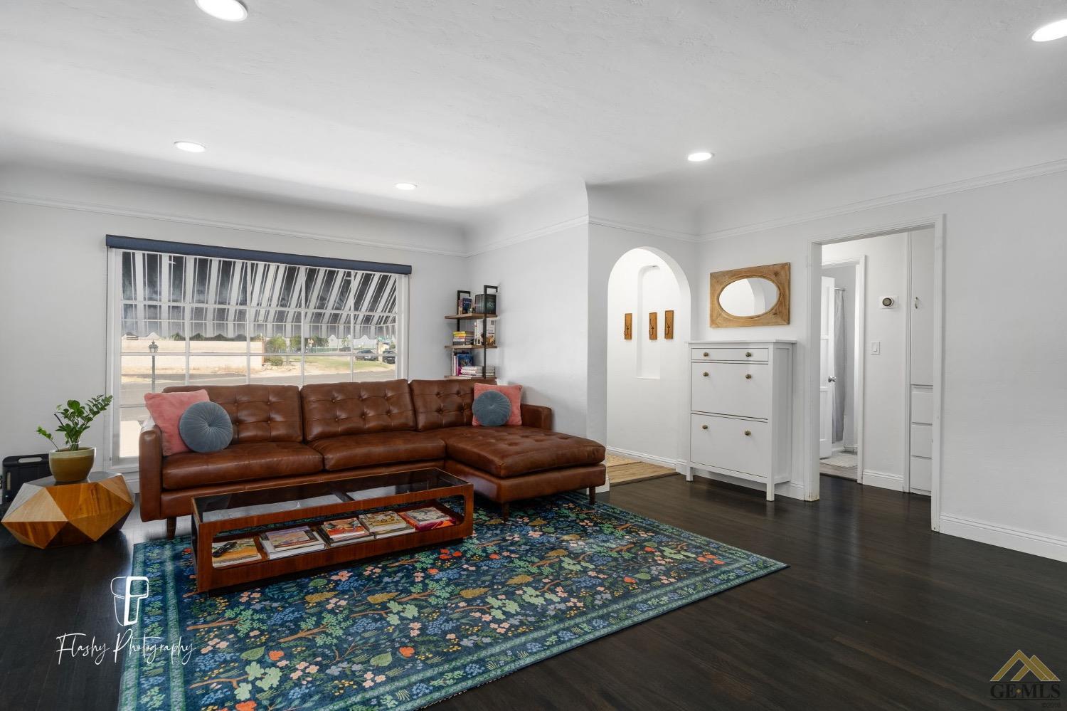 Undisclosed Address Bakersfield, CA 93305 - Photo 9 of 20 a living room with furniture and wooden floor